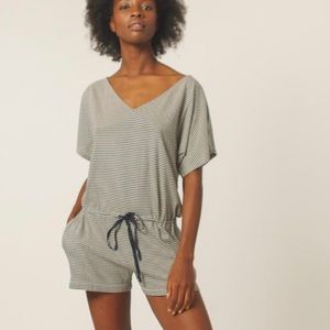 Romper black and white stripes. New with tags!